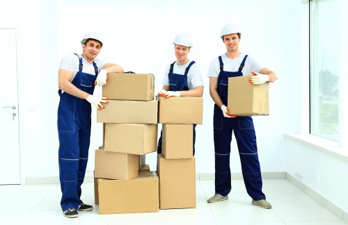 Local moving team handling furniture and boxes in Stratford