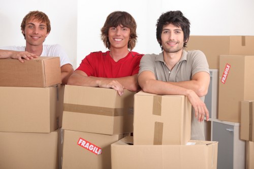 Careful unloading of boxes and furniture at a property