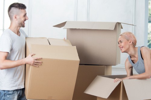 Professional movers handling flat removals in Stratford with lift access considerations