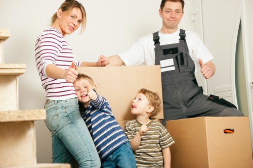 Removal crew handling desks and equipment during an office move